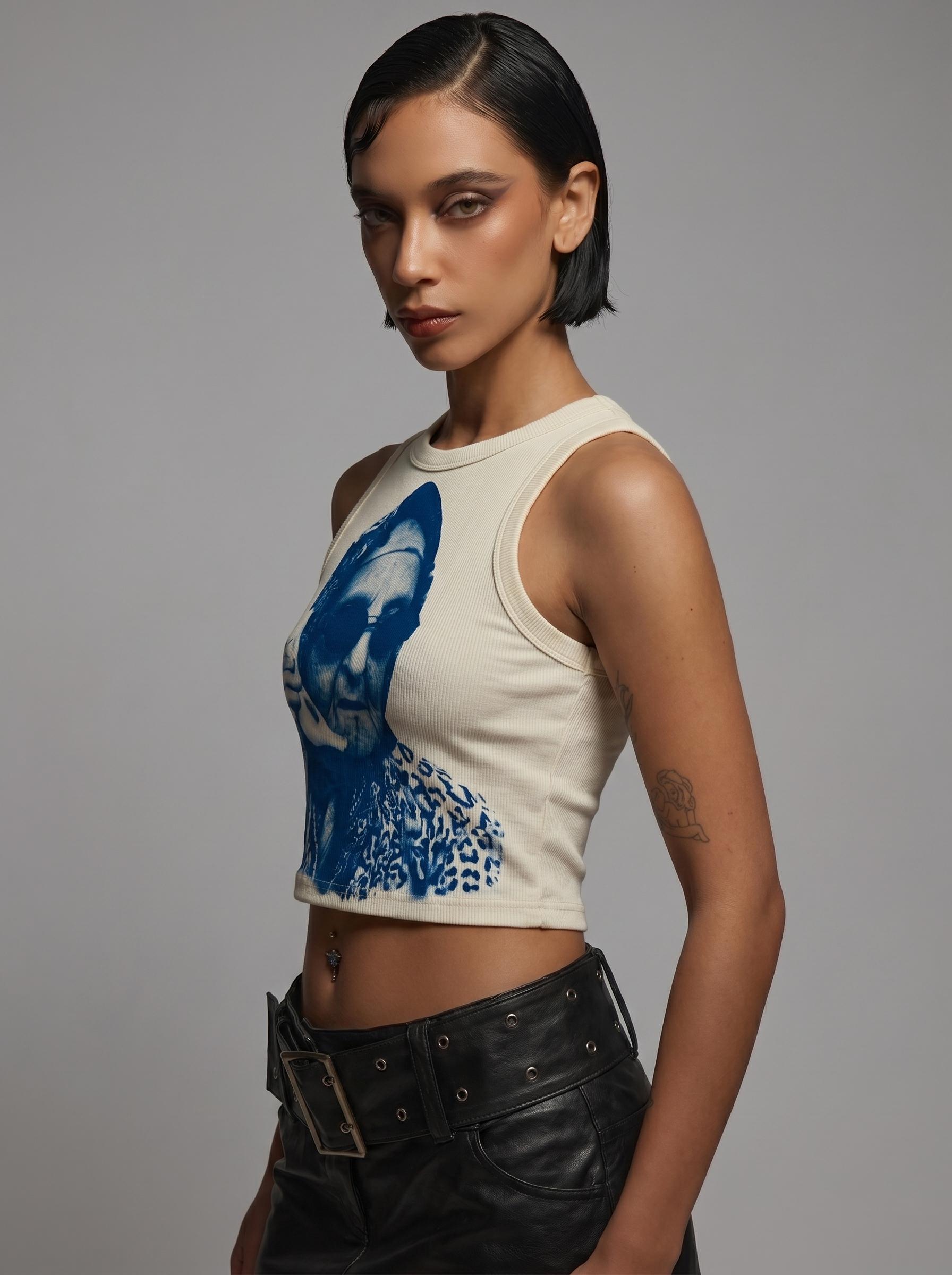 Model wearing crop top, studio portrait